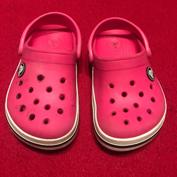 pink and black crocs